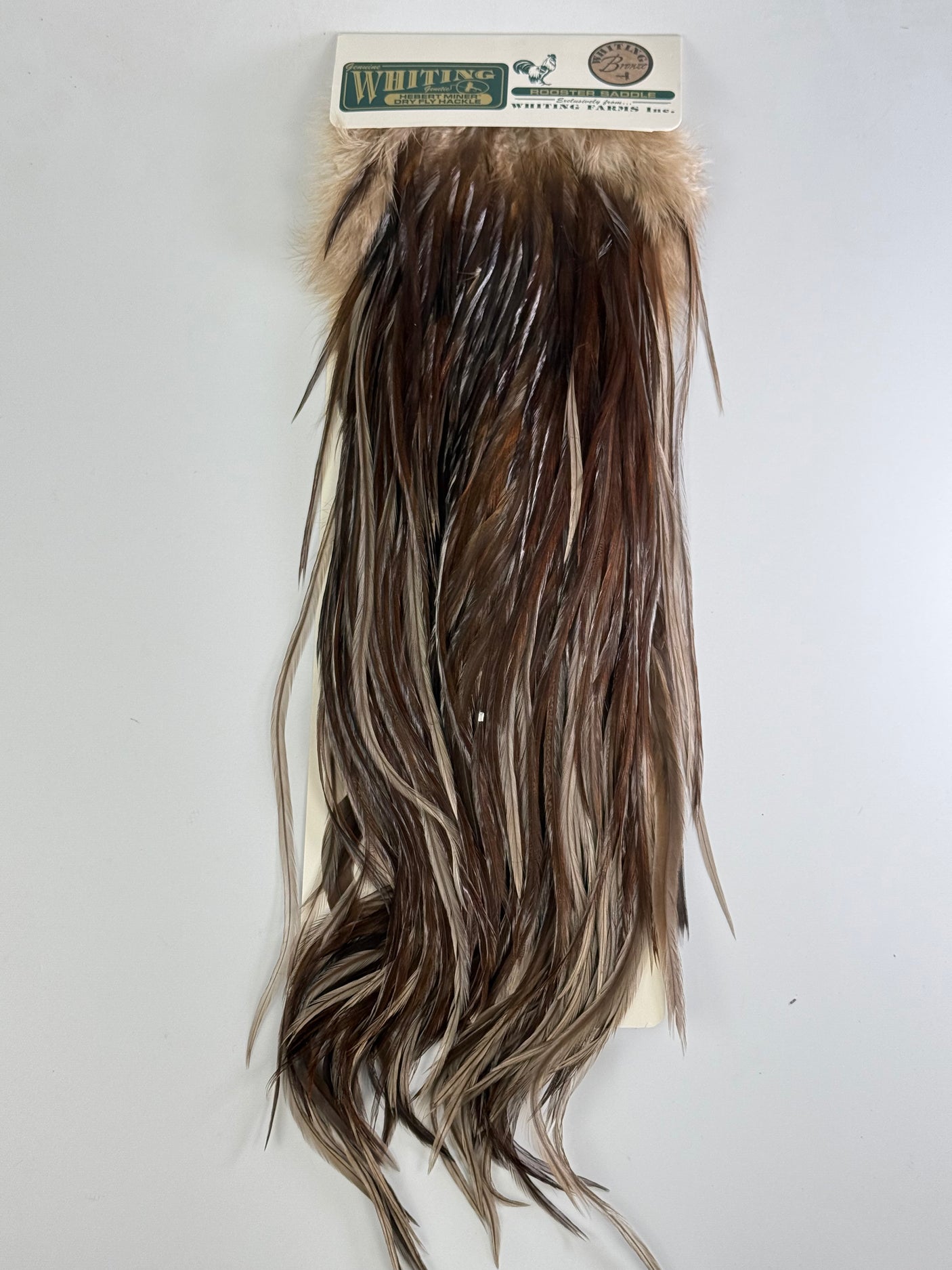 Whiting Hebert Miner Bronze Hackle Saddle