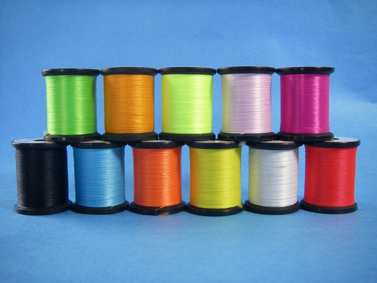12x large spools of tinsel,thread and floss  in a plastic protective bag 4 each 